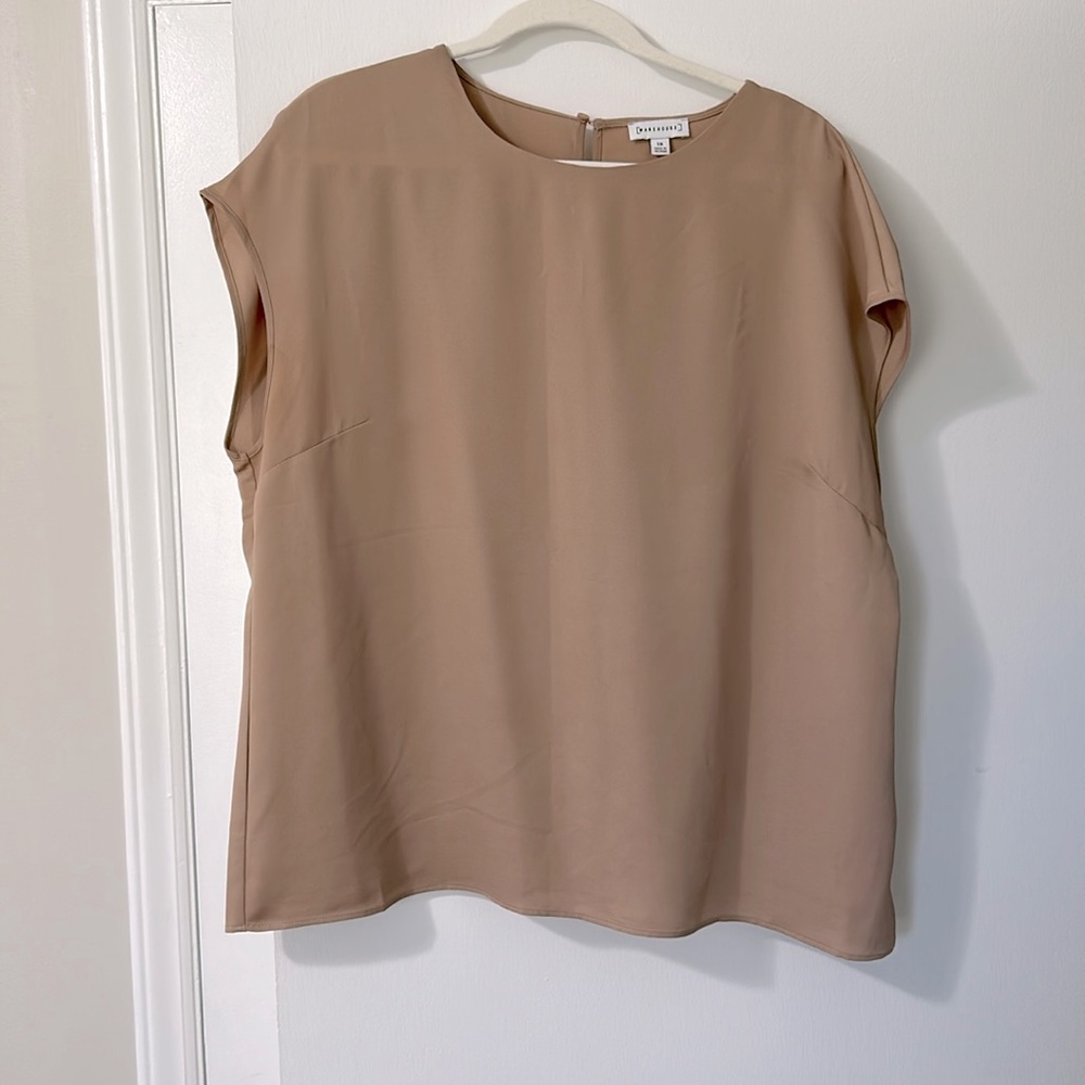 Women’s nude/brown blouse.